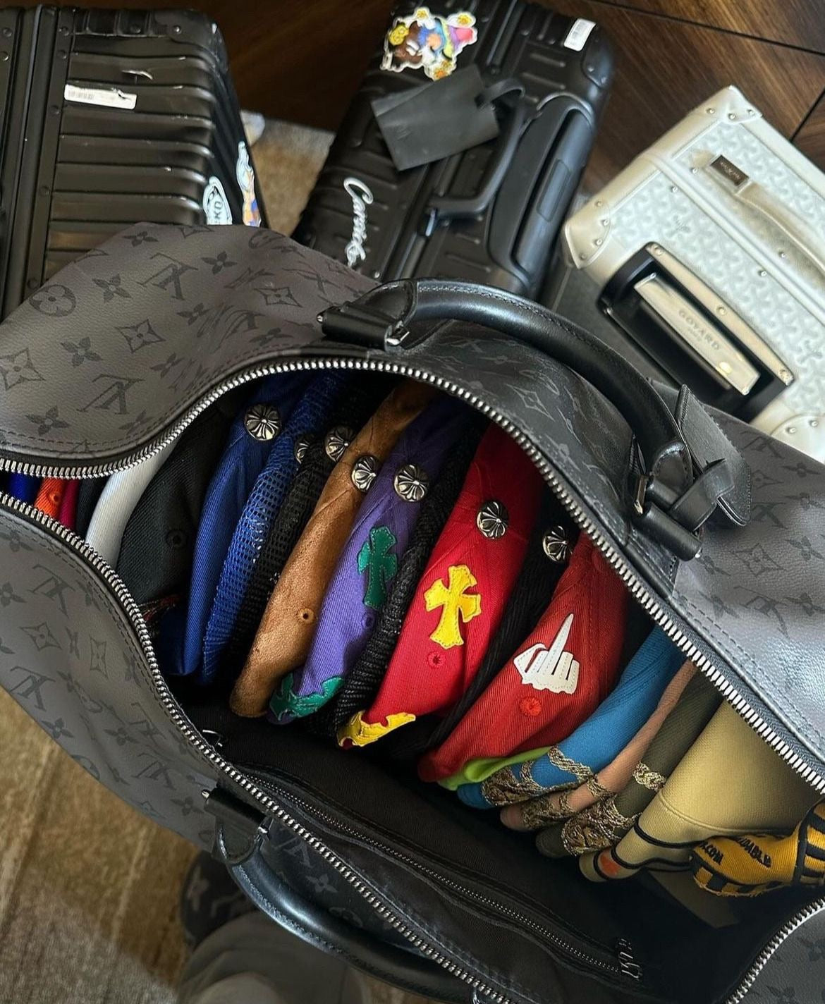 Curated designer accessories packed for a Sneaker Vault Tysons shopping appointment